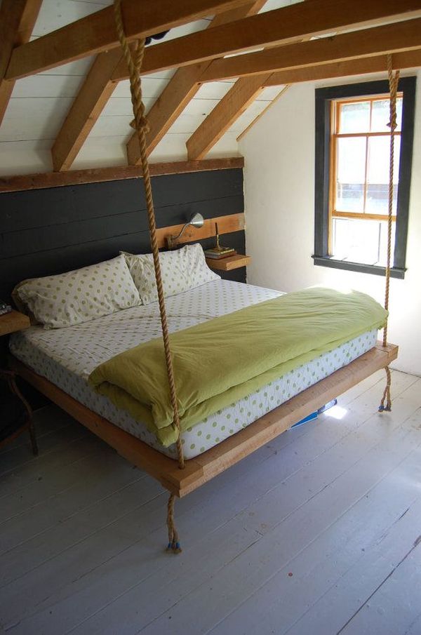 Exposed ceiling beams hang bed