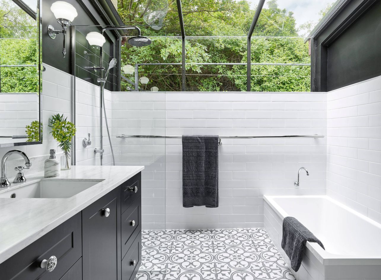Black and white bathroom with skylight