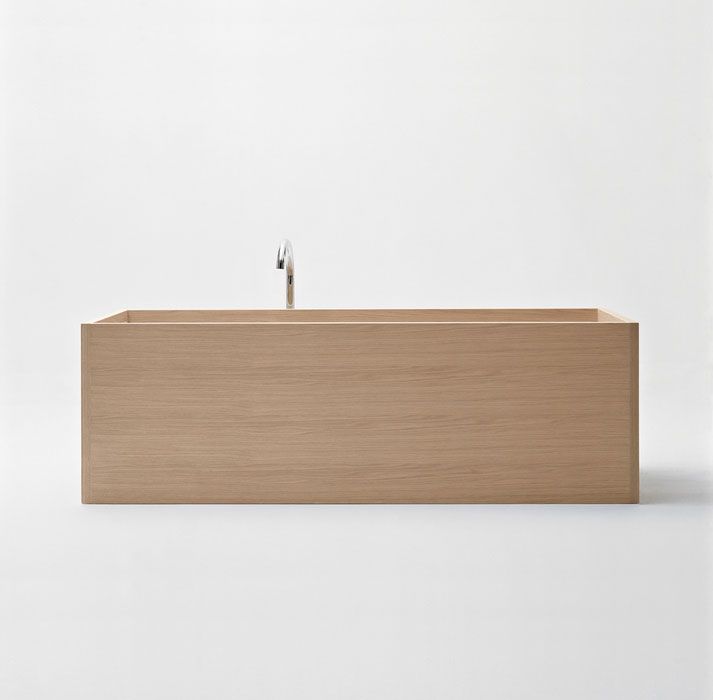 Even in this rectangular wooden bathtub by Unique Wood Design, the light wood and spare style evoke an Asian esthetic.