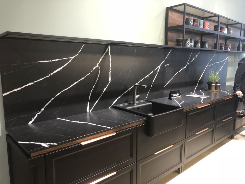 Black marble backsplash with white veins
