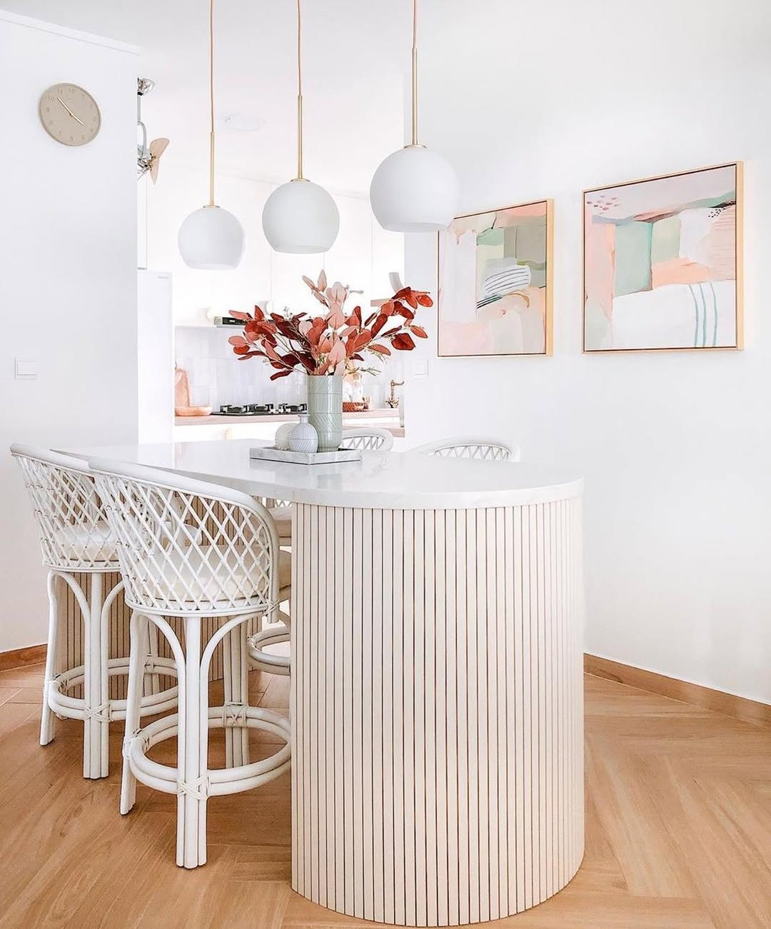 Soft neutral kitchen decor with round island