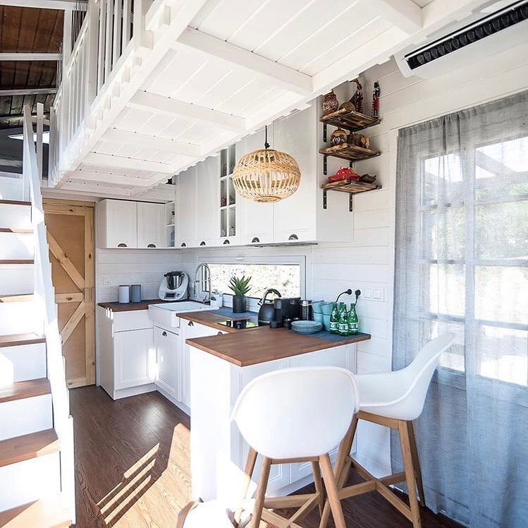 Bright L Shape Kitchen Under the Loft Walkway