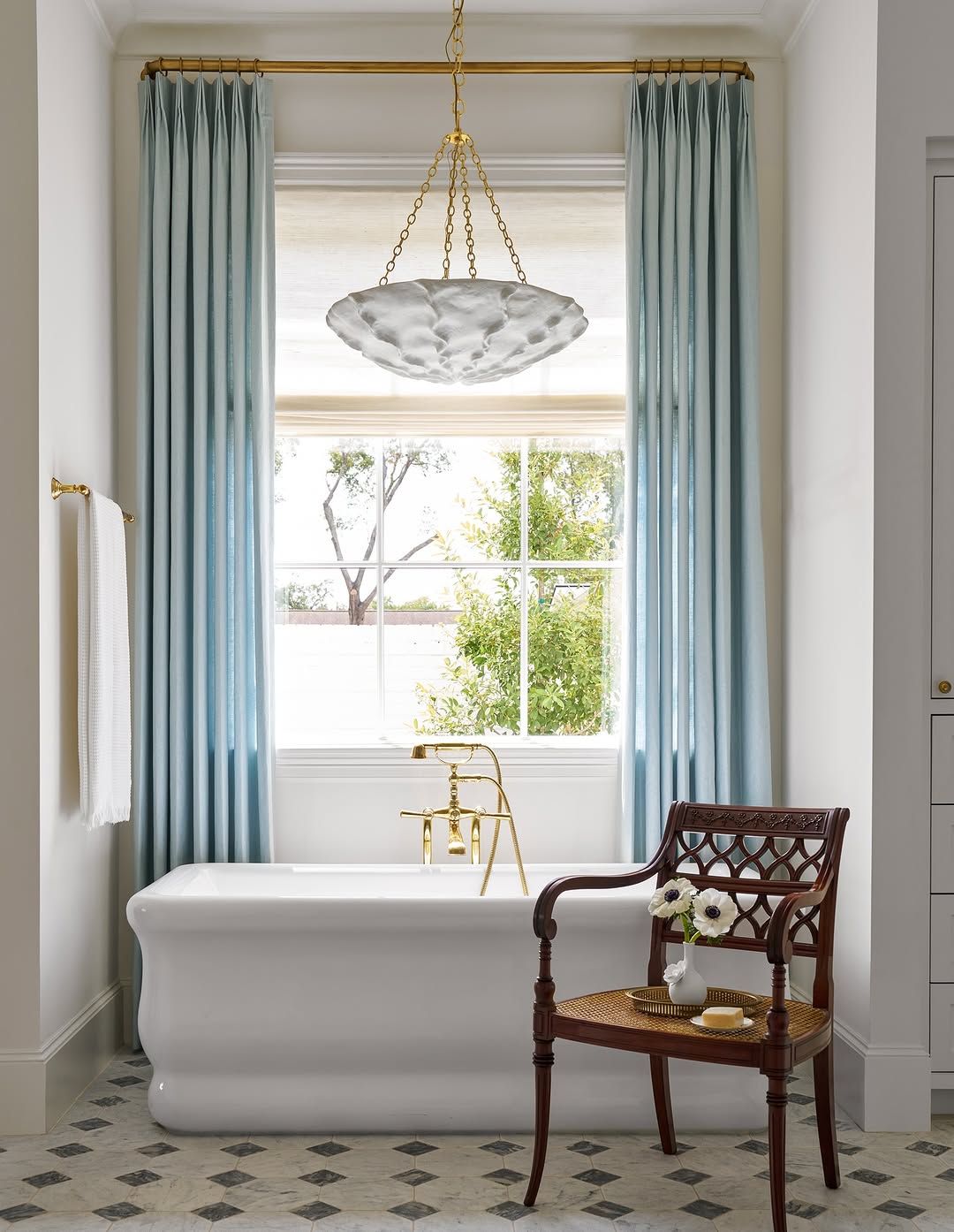 Bright Tub Nook with Blue Drapery