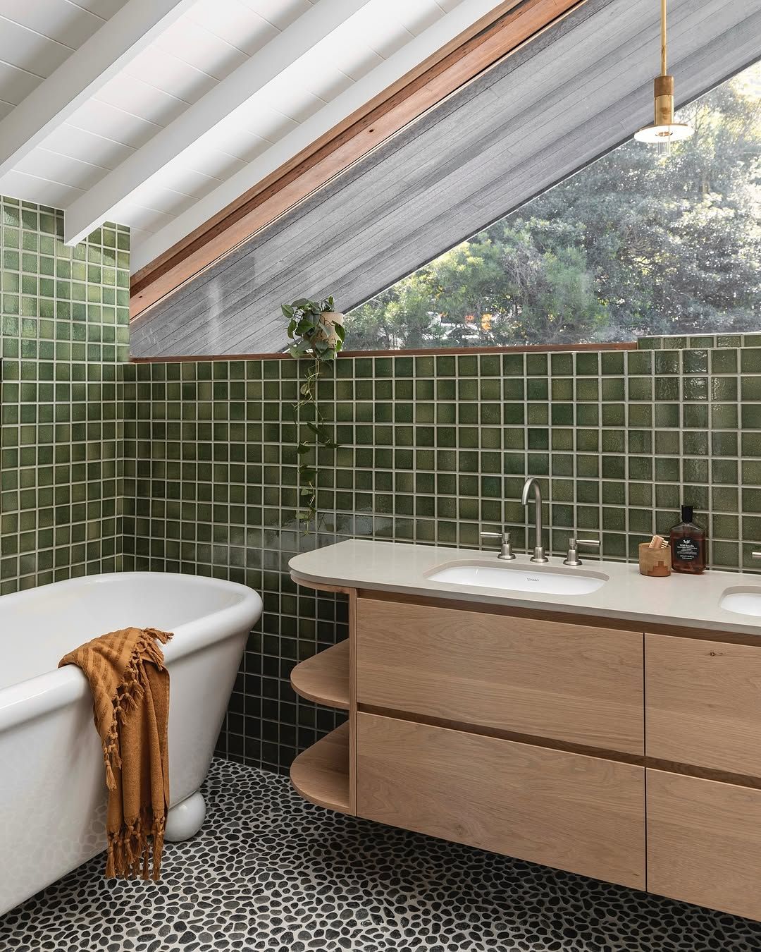 Green Mosaic Tiles in a Sloped Ceiling Bathroom