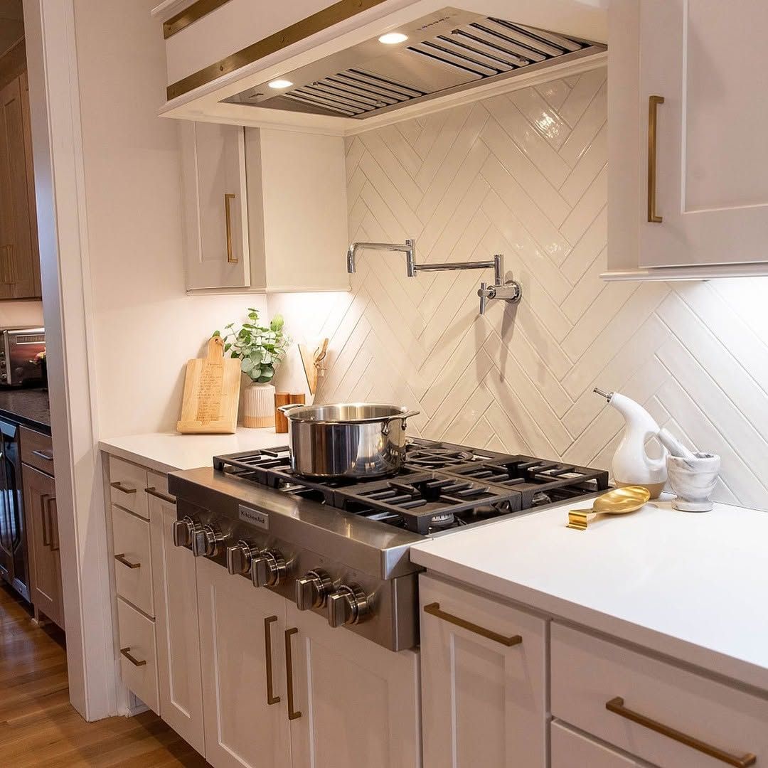 Herringbone Backsplash With Chrome Pot Filler