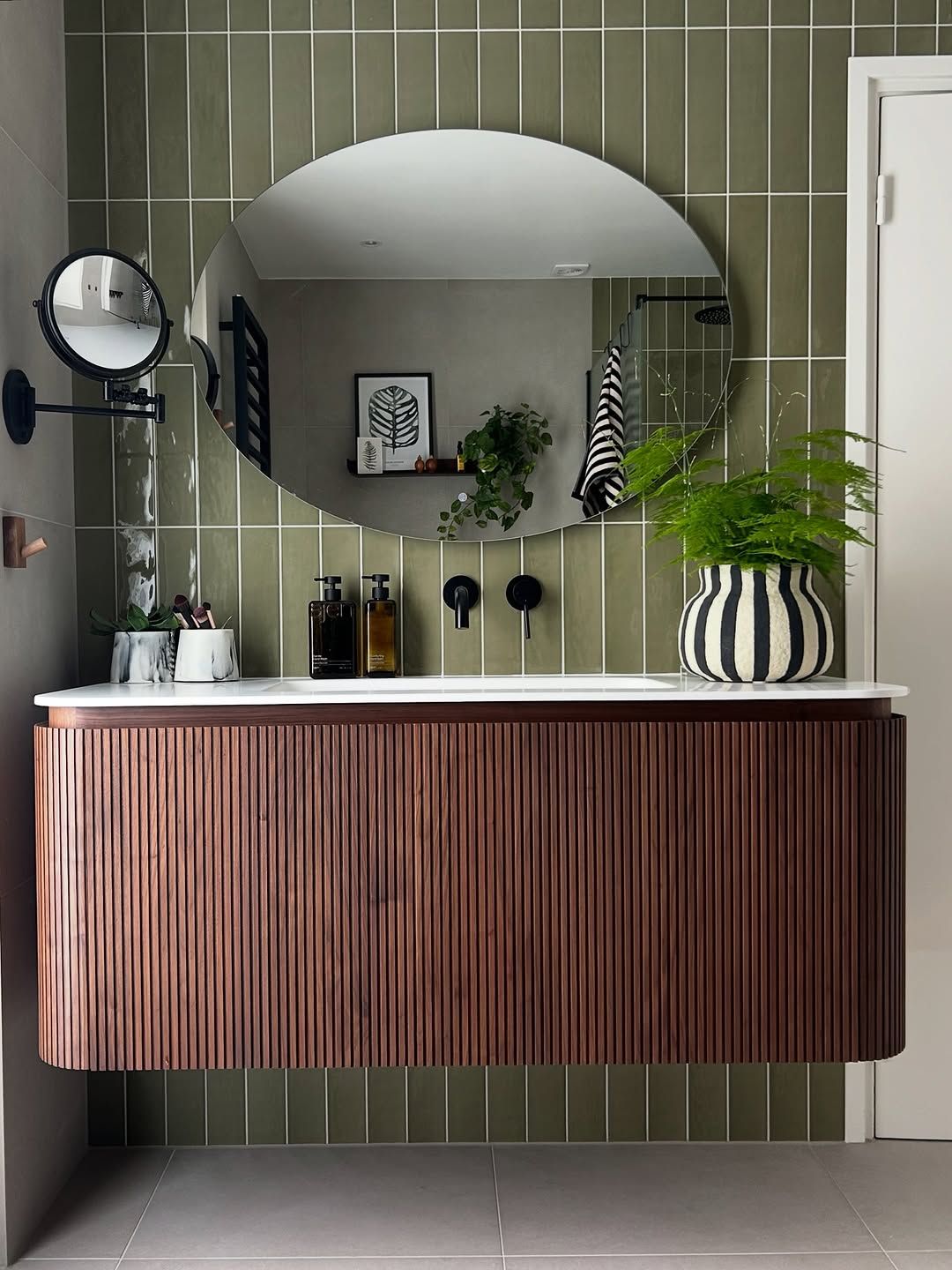 Olive Tiles With Curved Wood Vanity