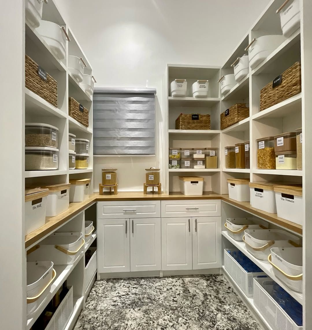 Organized Pantry with White Bins and Labeled Containers