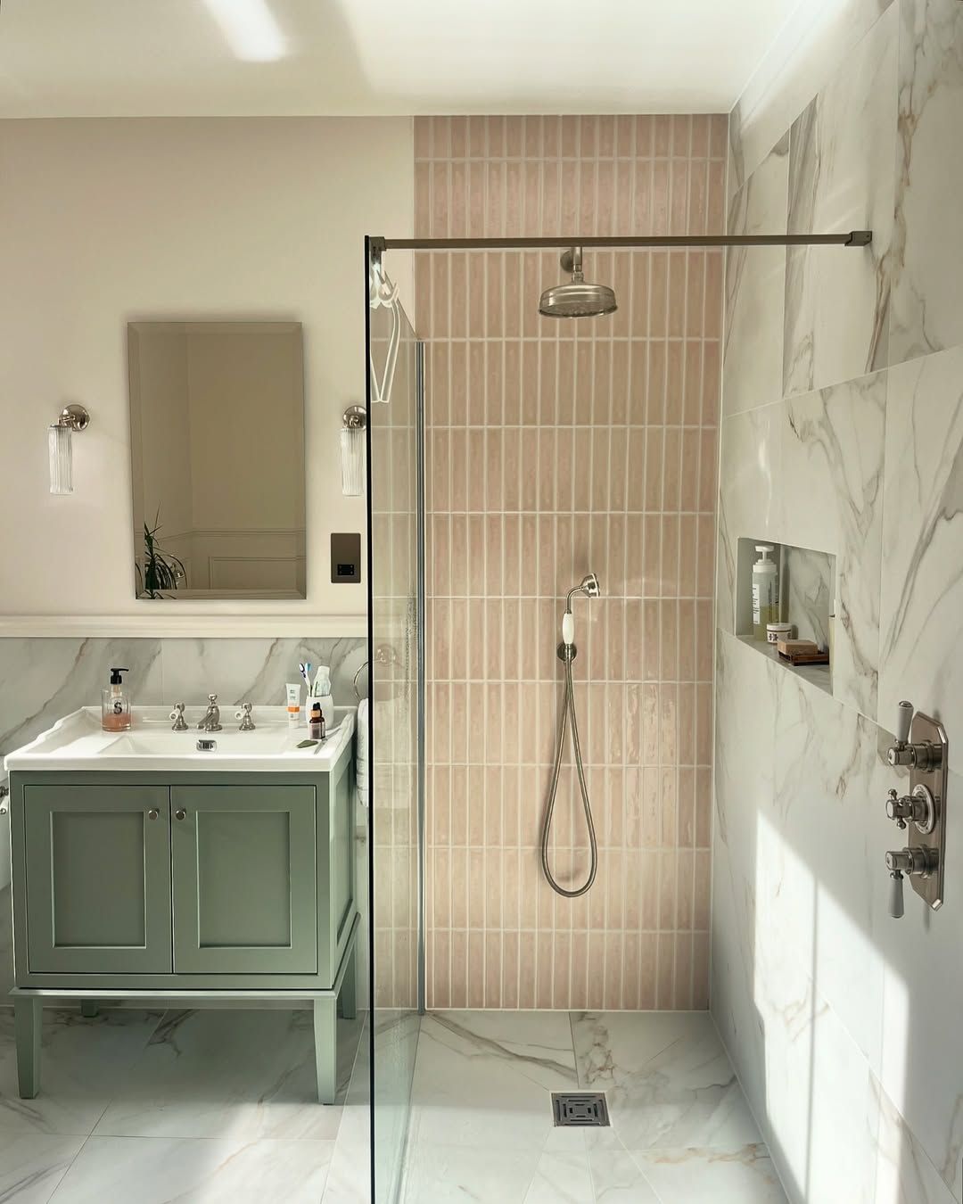 Soft Pink Shower Wall with Marble Surround