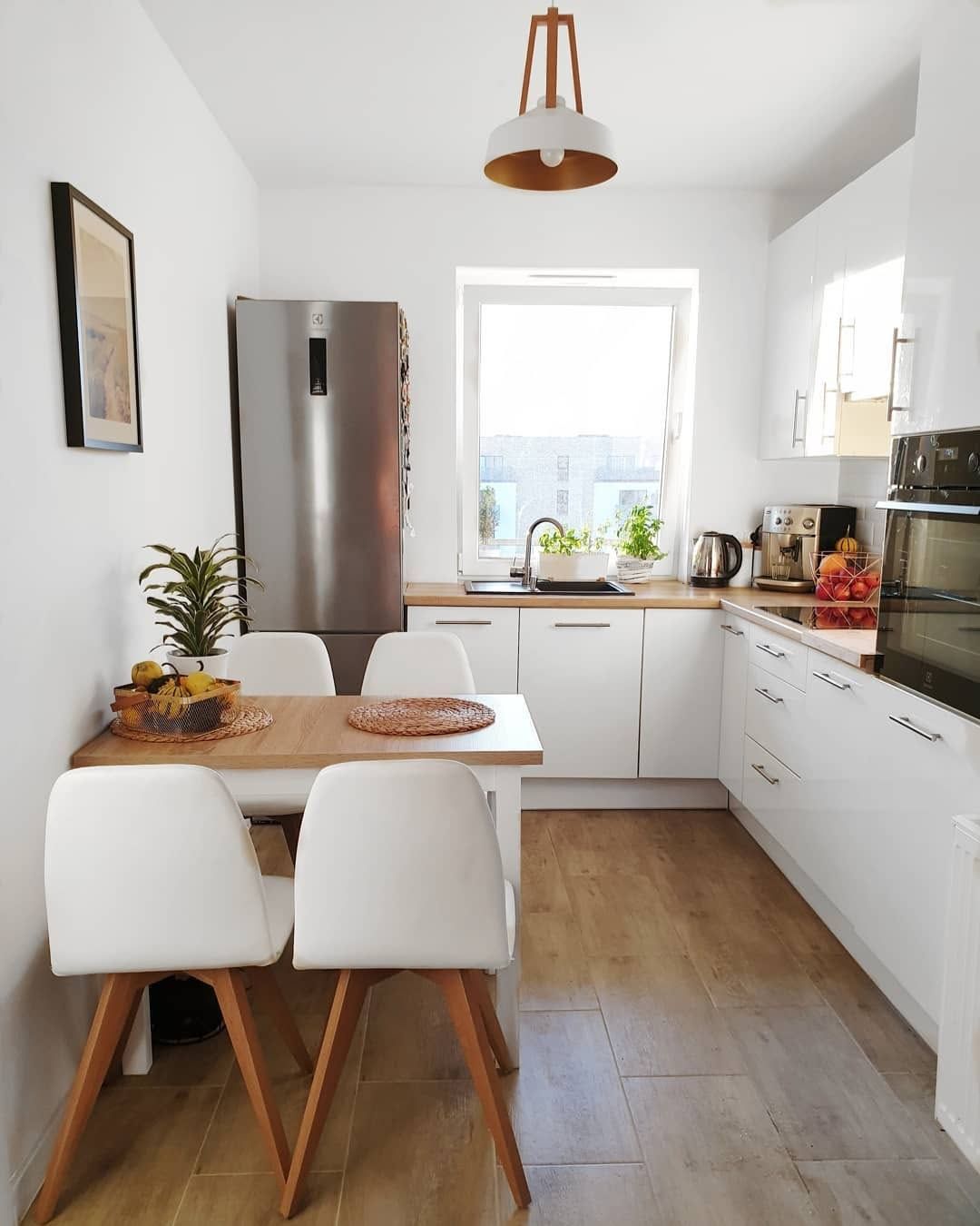White Small Kitchen with a Simple Dining Corner Copy
